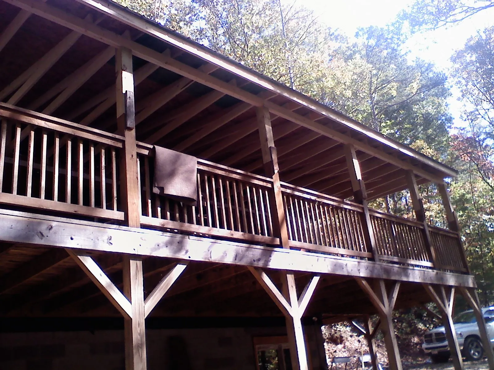 Timber framing under a new elevated porch and deck — Roof Leak Repair in Rose Hill by Roofing Brothers